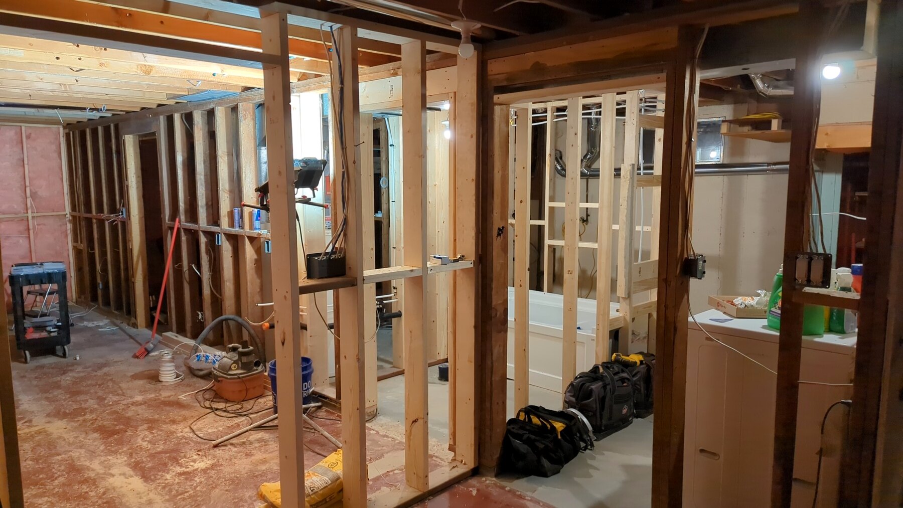 Open basement framing around a room and doorway
