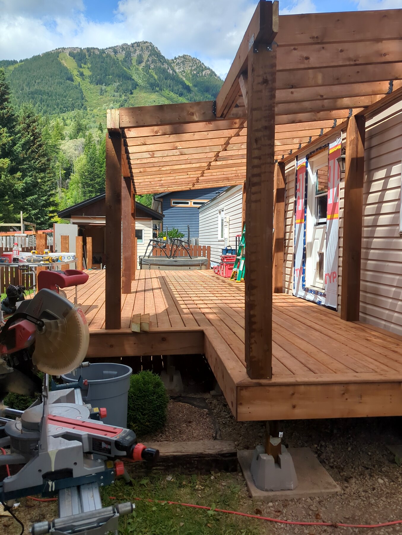 Deck framing with upright posts and stair structure
