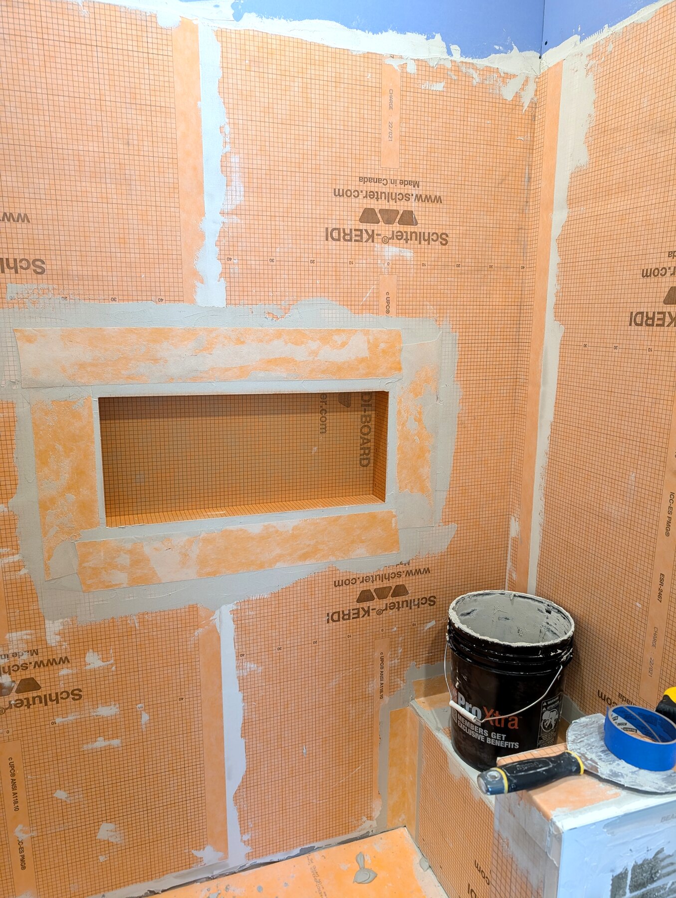 Bathroom renovation in Elkford — waterproofed shower wall and storage niche