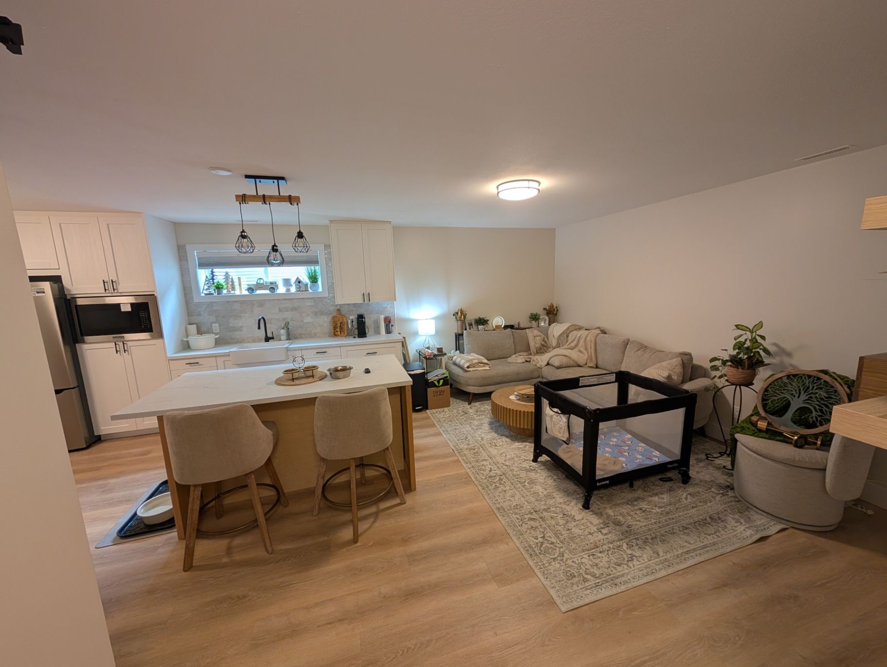 Whole-home renovation in the Elk Valley — kitchen and living area connected by an open plan