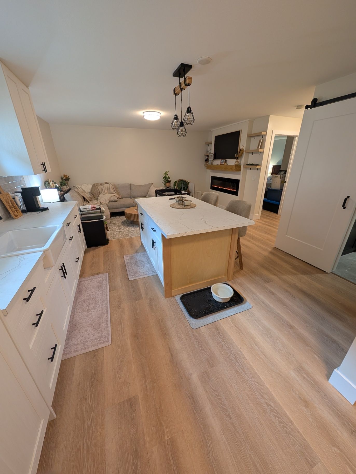 View across the kitchen toward the living area