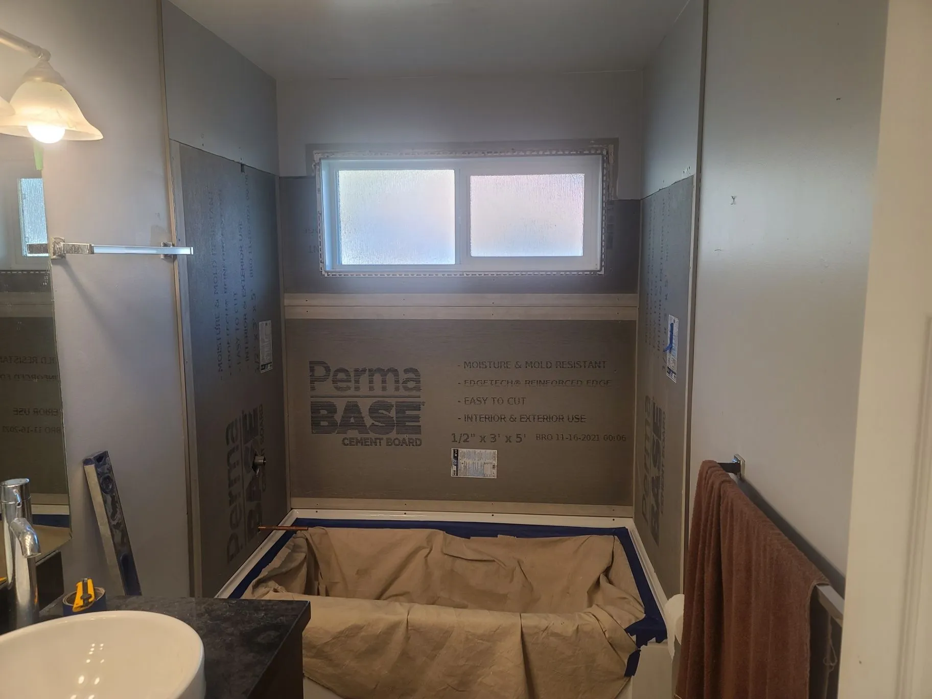 Bathroom tub surround with backer board installed