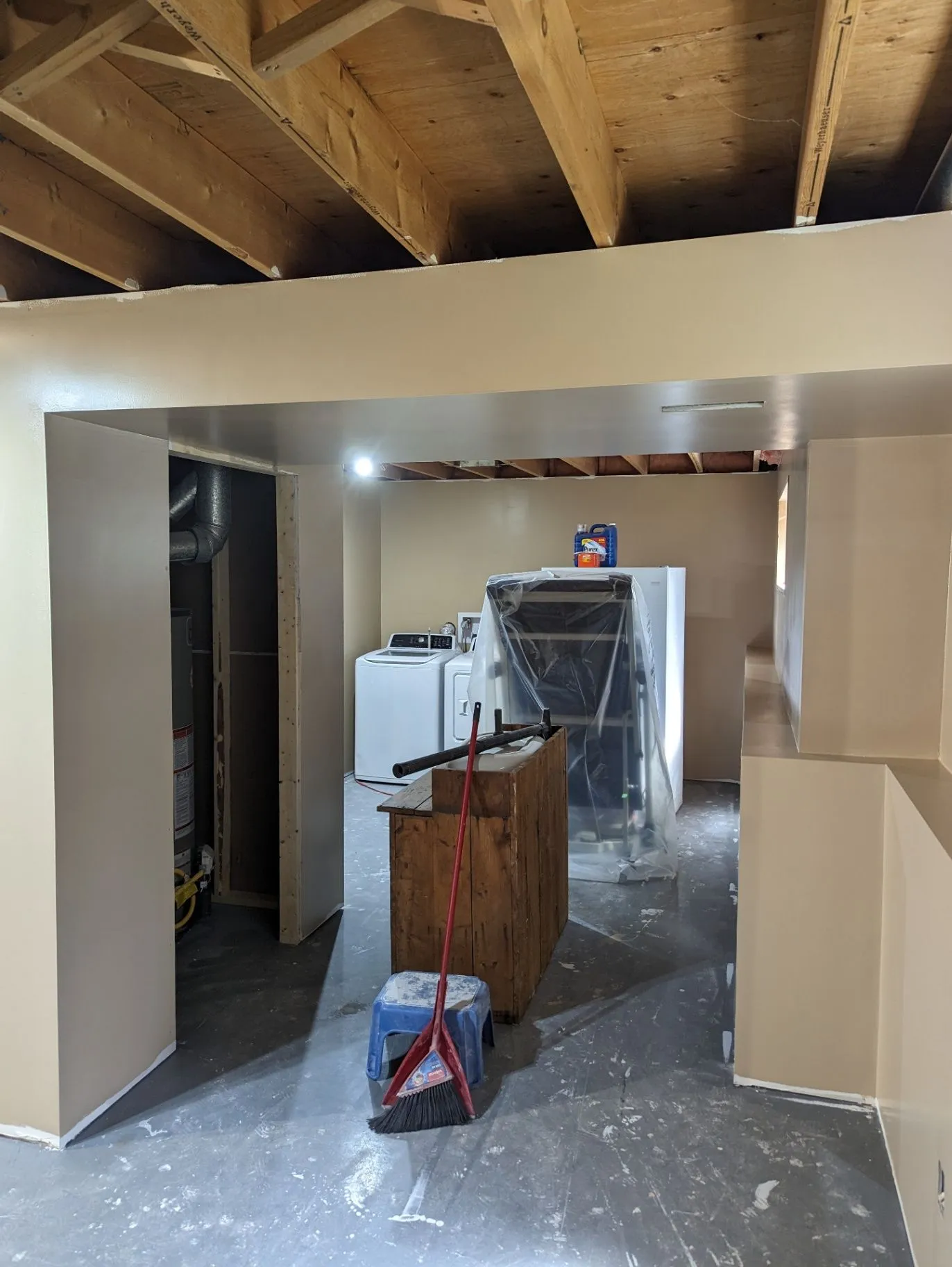 Commercial room with built-ins and tools during renovation