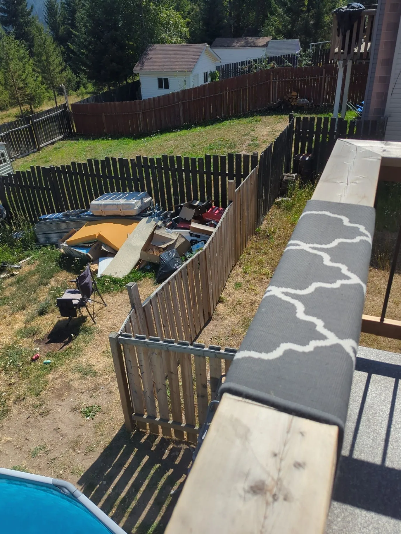Fence line and deck edge work viewed from above