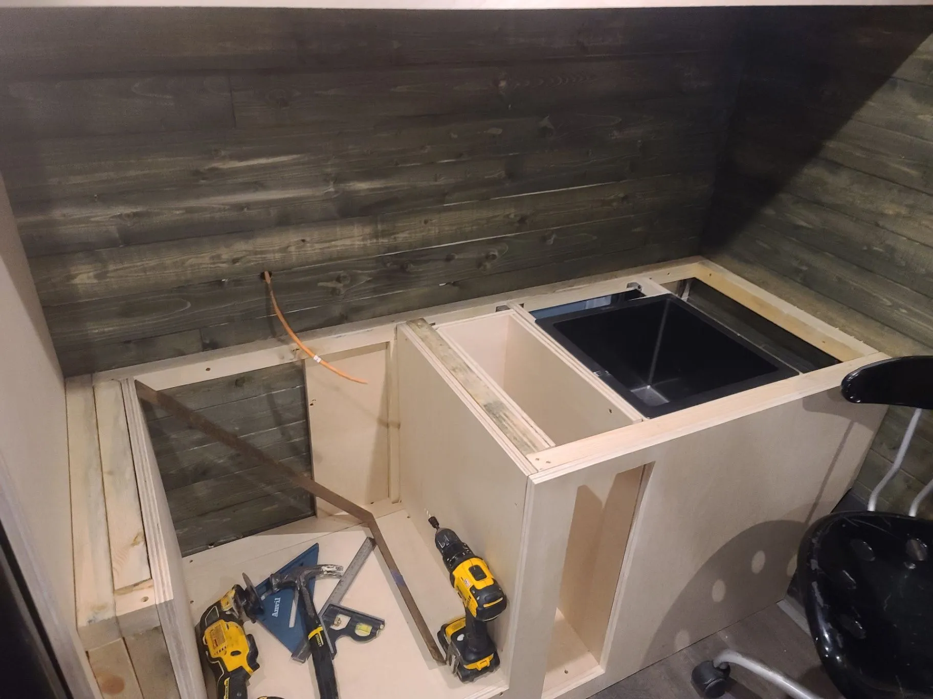Kitchen counter framing with sink cut-out and tools