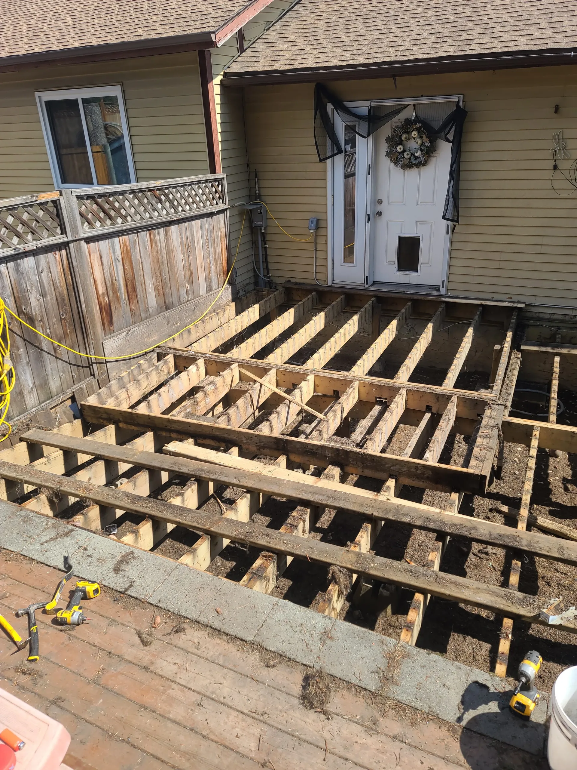 Deck stairs and framing in progress