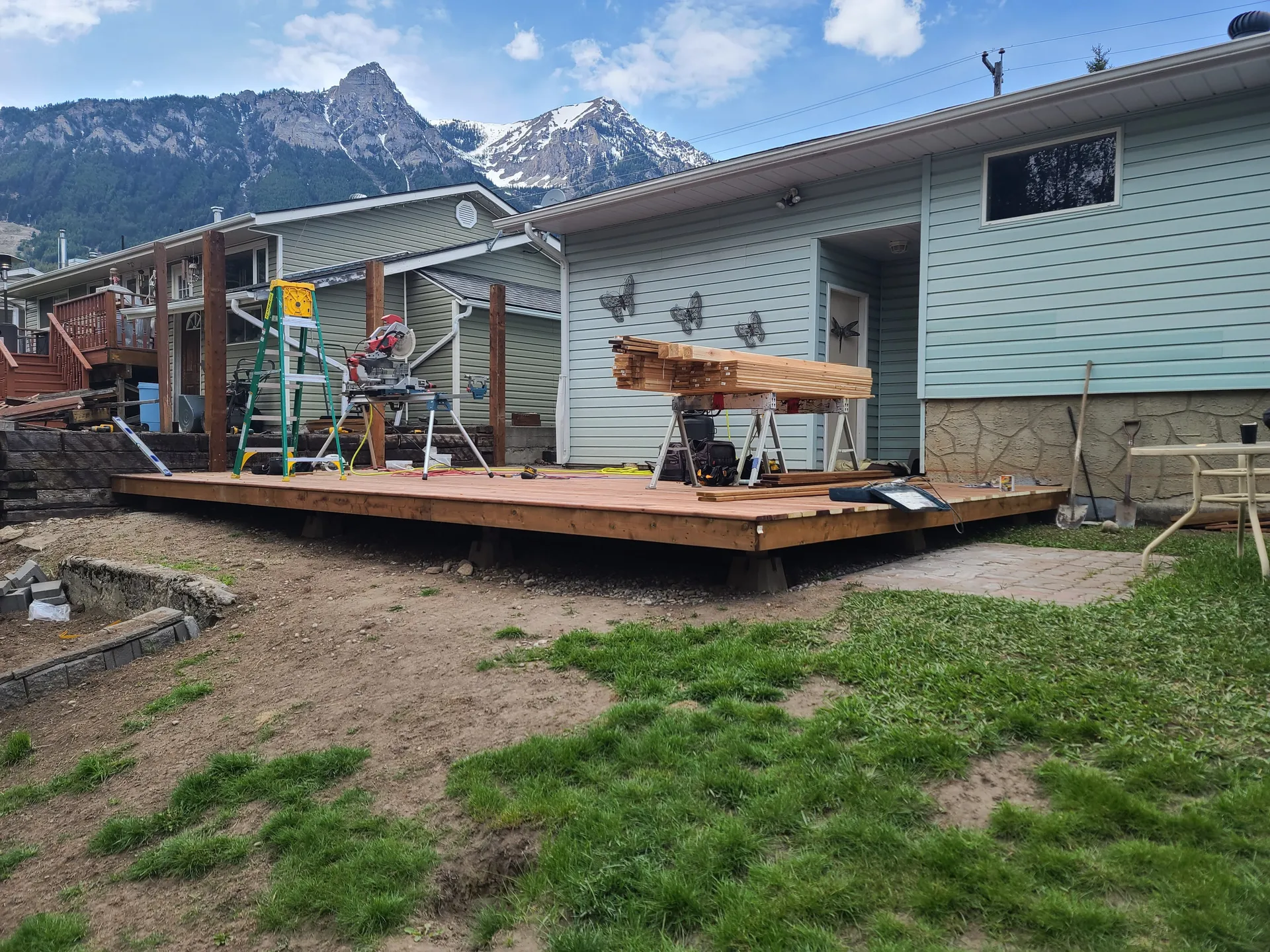 Completed large deck with privacy fence and mountain view